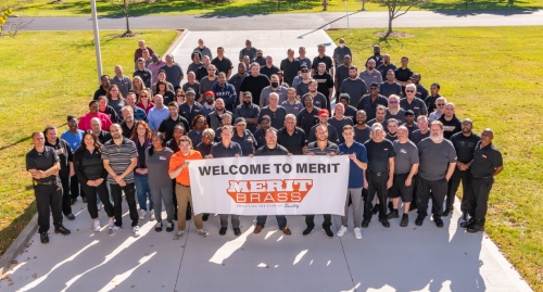 Merit Brass team group image outside the Cleveland Headquarters and PVF manufacturing & distribution facility